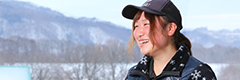 a young female horseback riding guide